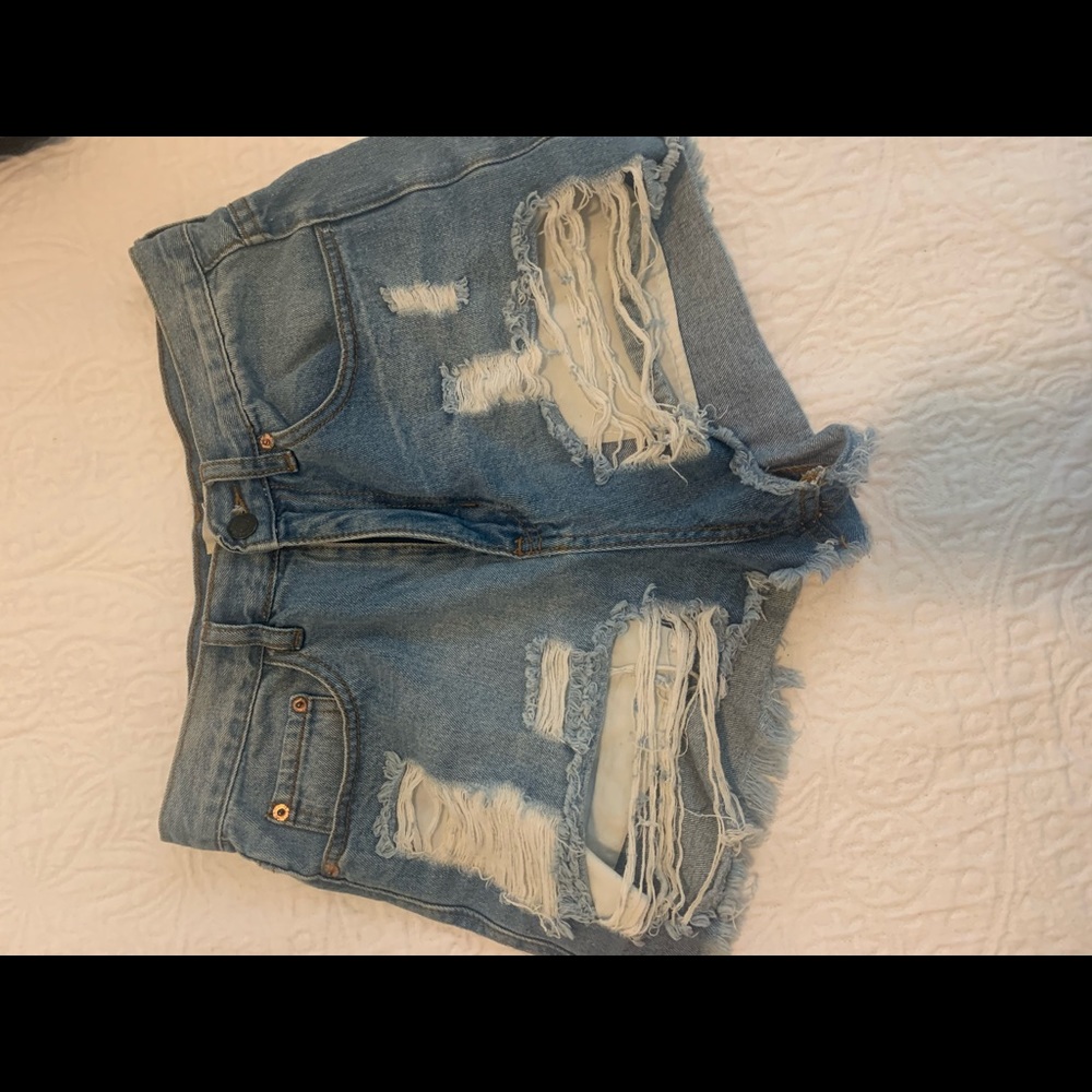 Distressed denim shorts